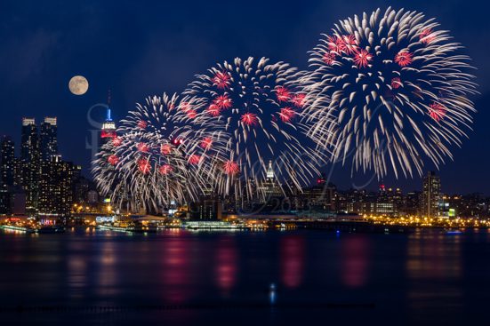 Fireworks And Full Moon Over New York City